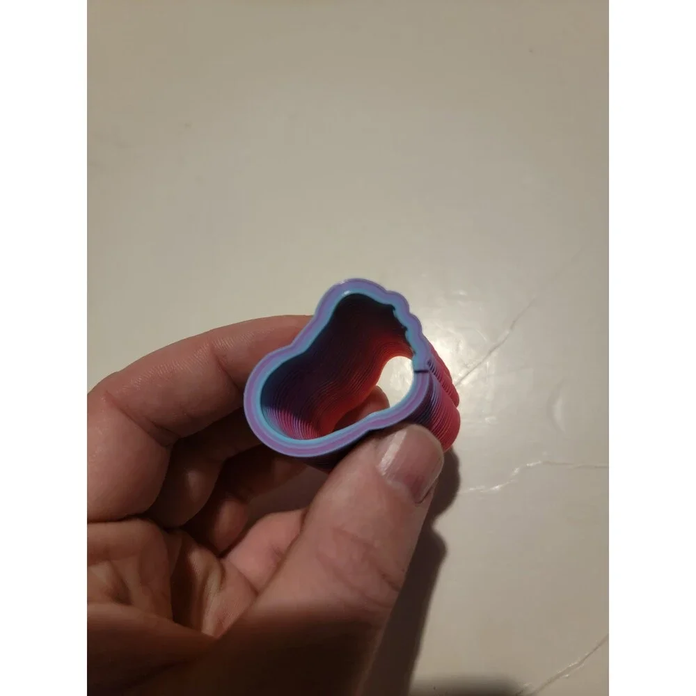 Mini Slinky Style Toy Rainbow Multi Color Spring Coil Foot Shape?